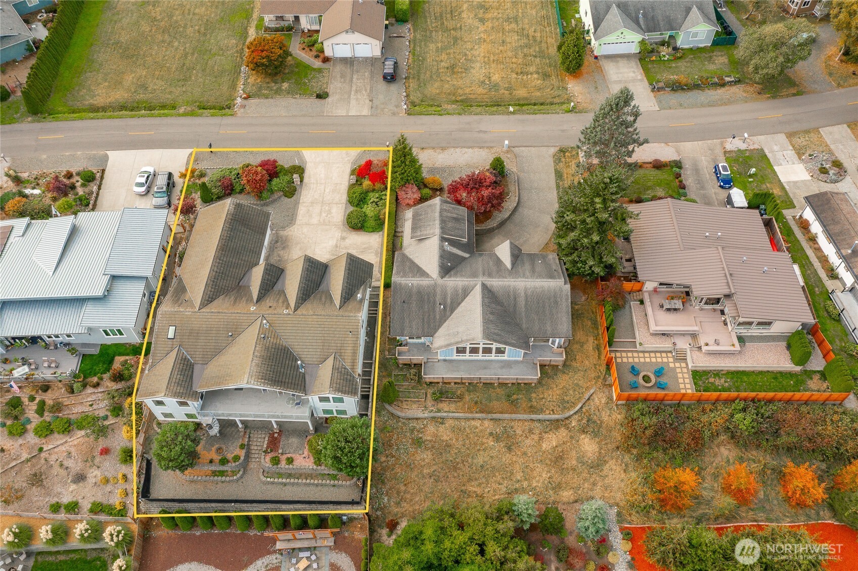 8118 Comox Road Blaine, WA 98230 - Photo 3 of 40 an aerial view of residential houses with outdoor space