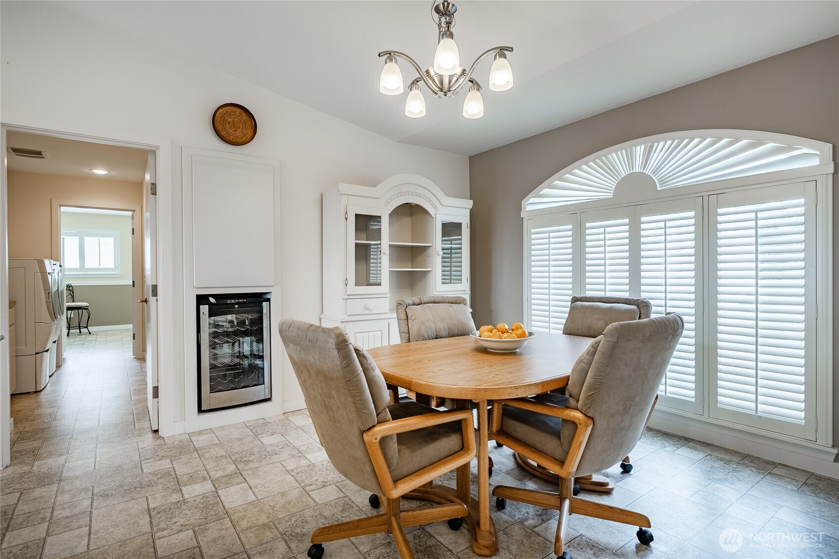 8118 Comox Road Blaine, WA 98230 - Photo 10 of 40 a view of a dining room with furniture and wooden floor