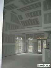 2310 Umberger Road Cleveland, NC 27013 - Photo 3 of 3 a view of a glass door of the house