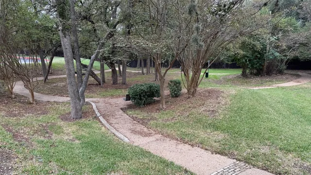 a front view of a house with outdoor space