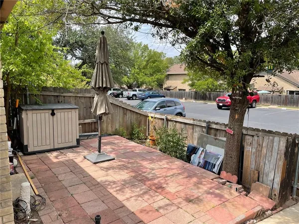 a front view of a house with outdoor space
