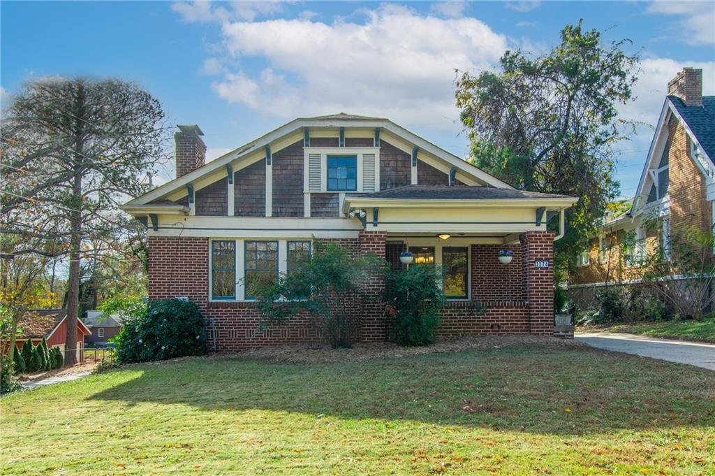 2274 Boulevard Granada Southwest Atlanta, GA 30311 - Photo 1 of 1 a front view of house with a garden