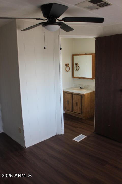 303 South Recker Road, Unit 128 Mesa, AZ 85206 - Photo 14 of 26 a view of a hallway with wooden floor