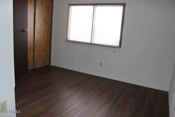 a kitchen with stainless steel appliances granite countertop a refrigerator sink and cabinets