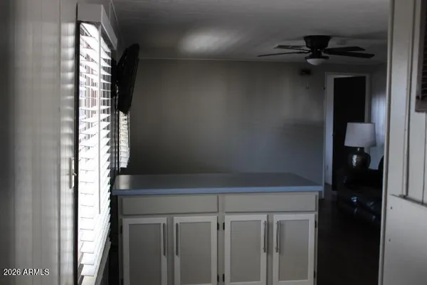 a bathroom with a shower and toilet