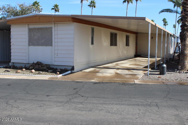303 South Recker Road, Unit 128 Mesa, AZ 85206 - Photo 25 of 26 a front view of house