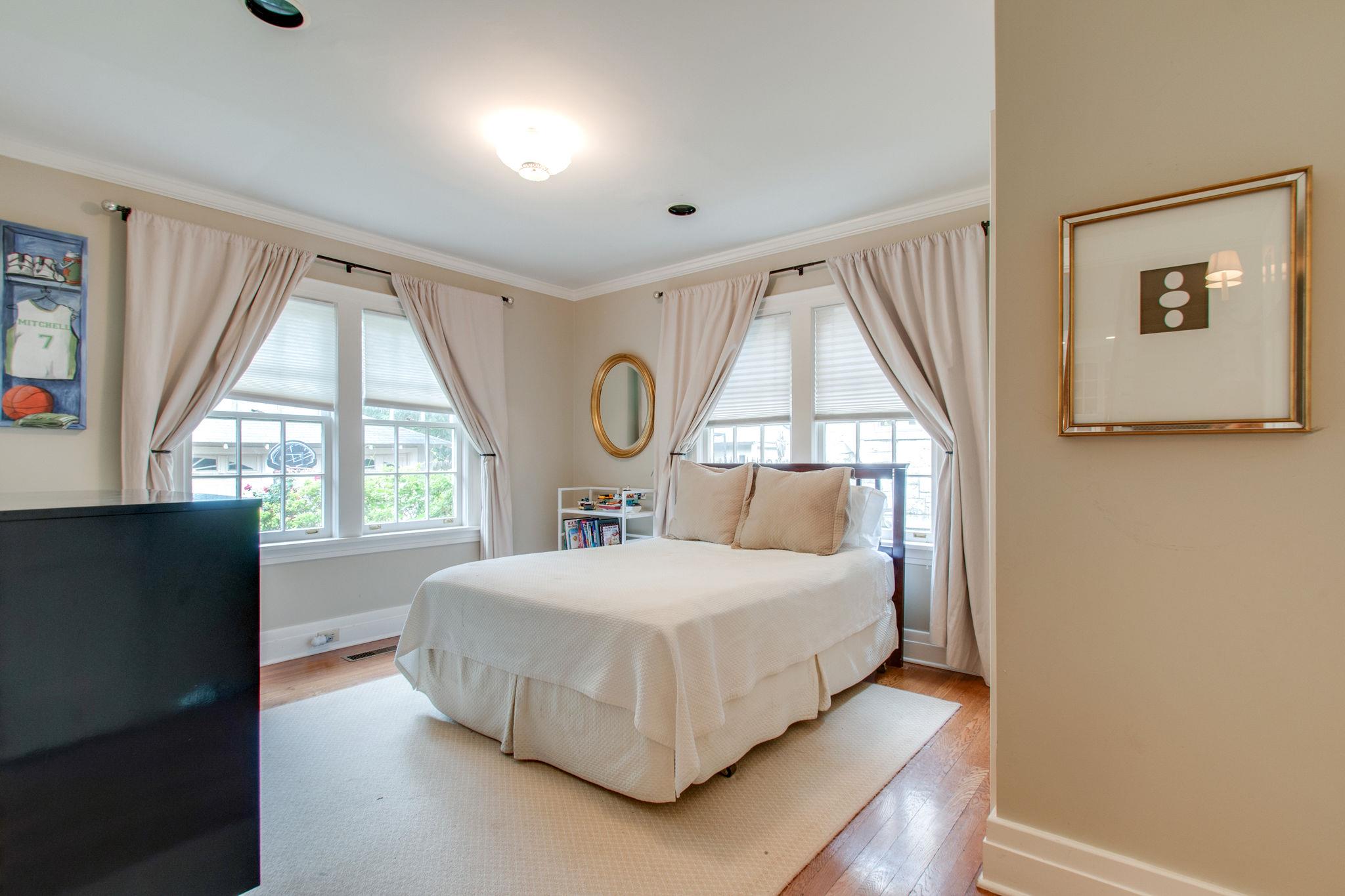 4018 Aberdeen Road Nashville, TN 37205 - Photo 13 of 20 a bedroom with a bed and a large window