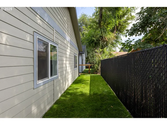 a bathroom with a toilet a sink and shower