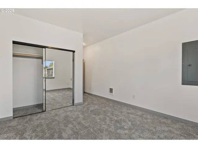 a view of a bathroom with a glass door