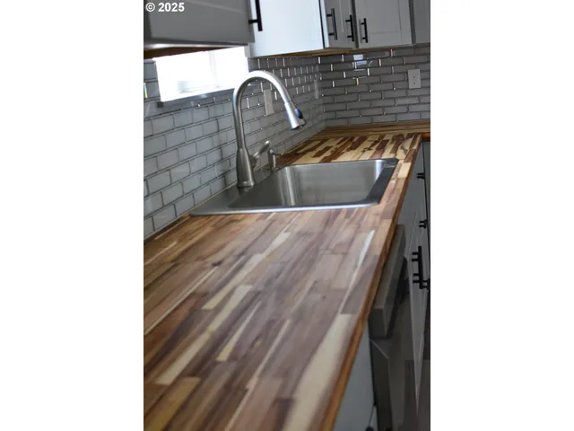 a close view of sink and mirror