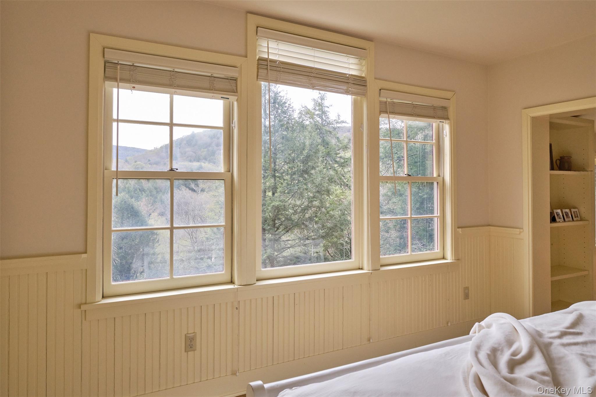 74 High Meadow Road Livingston Manor, NY 12758 - Photo 16 of 41 a view of a room that has a bed and a window