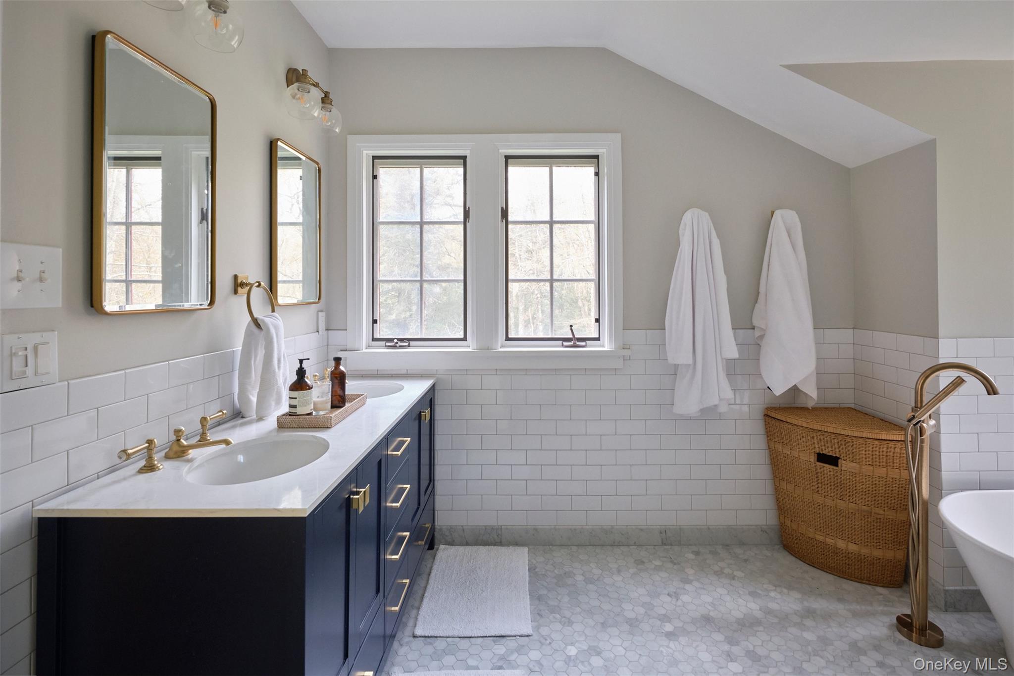 74 High Meadow Road Livingston Manor, NY 12758 - Photo 20 of 41 a bathroom with a sink a toilet and mirror
