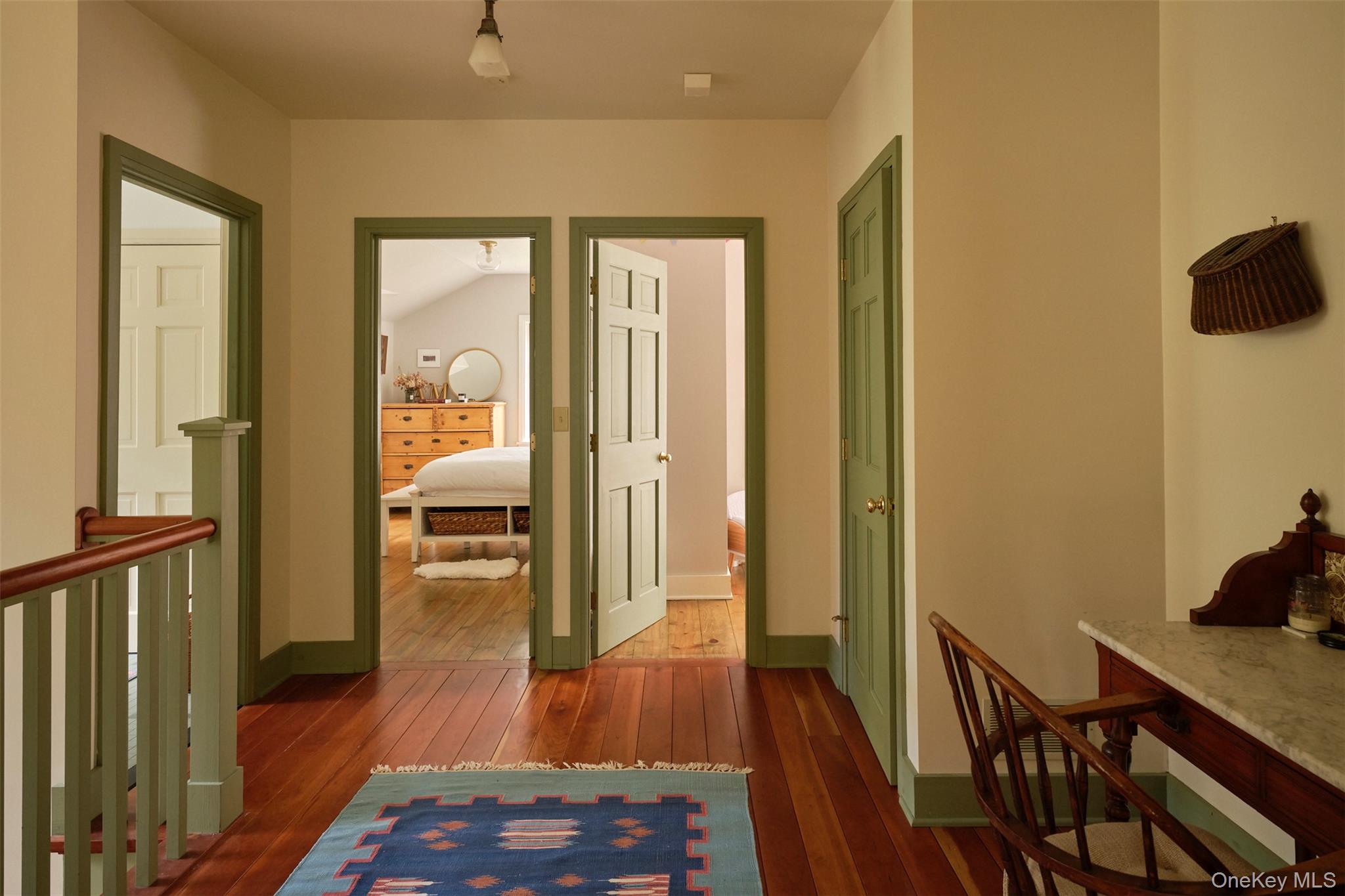 74 High Meadow Road Livingston Manor, NY 12758 - Photo 22 of 41 a view of a hallway with wooden floor and furniture