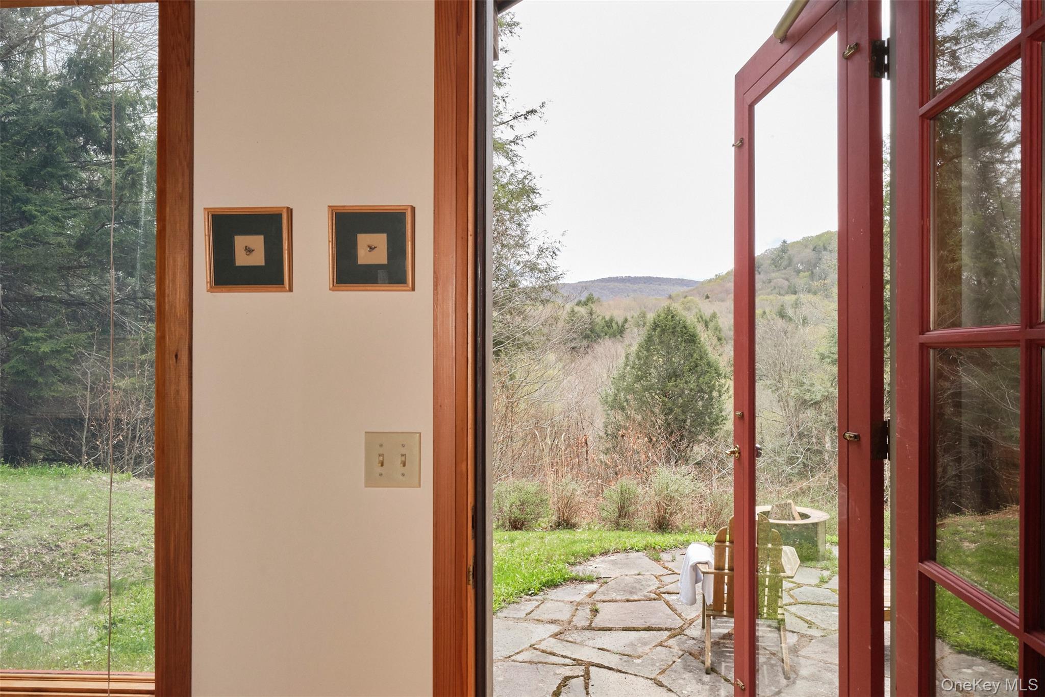74 High Meadow Road Livingston Manor, NY 12758 - Photo 6 of 41 a view of a room with a large window and wooden floor