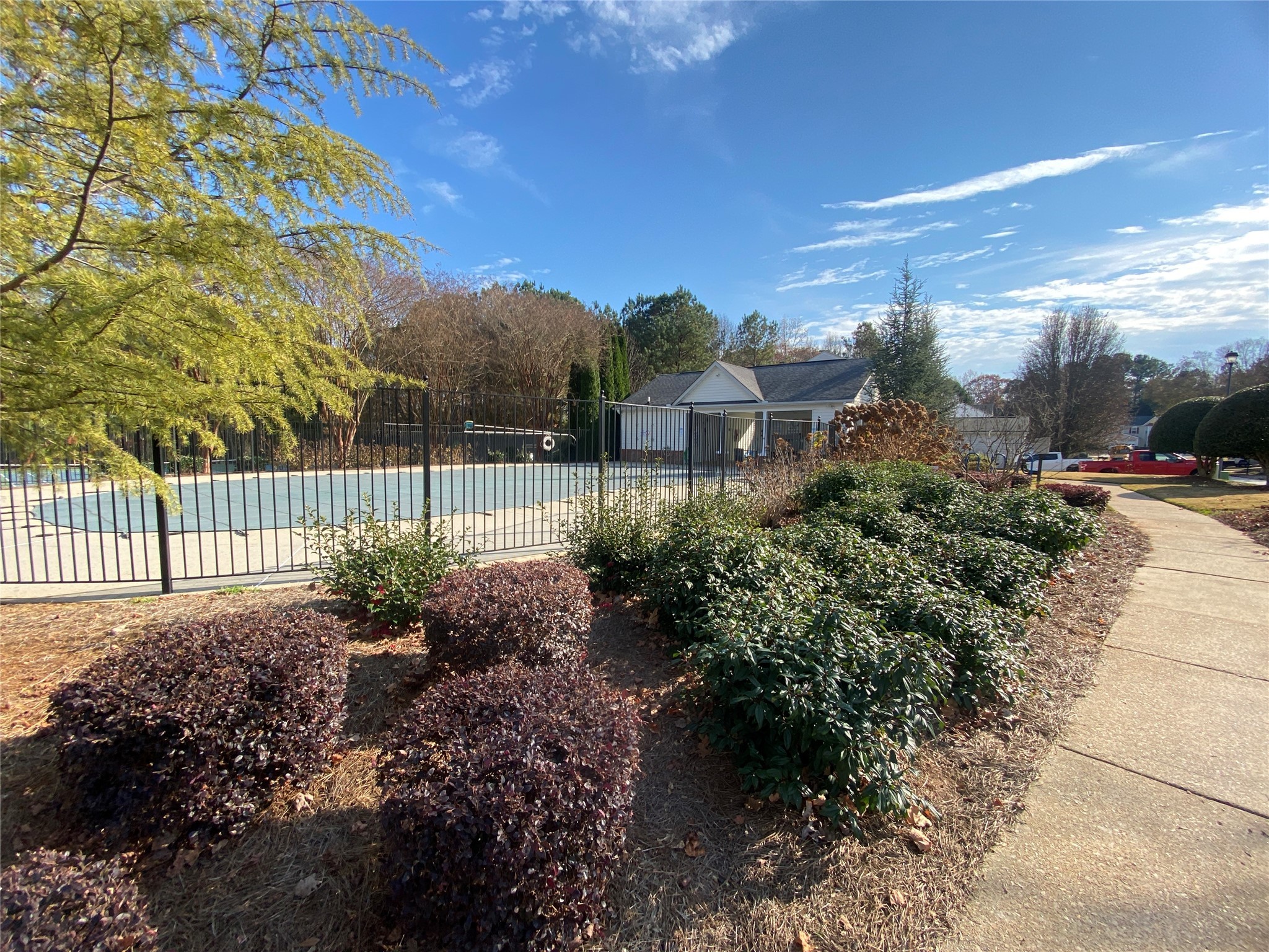 4717 Poplar Ridge Court Oakwood, GA 30566 - Photo 14 of 15 a view of a garden with pathway