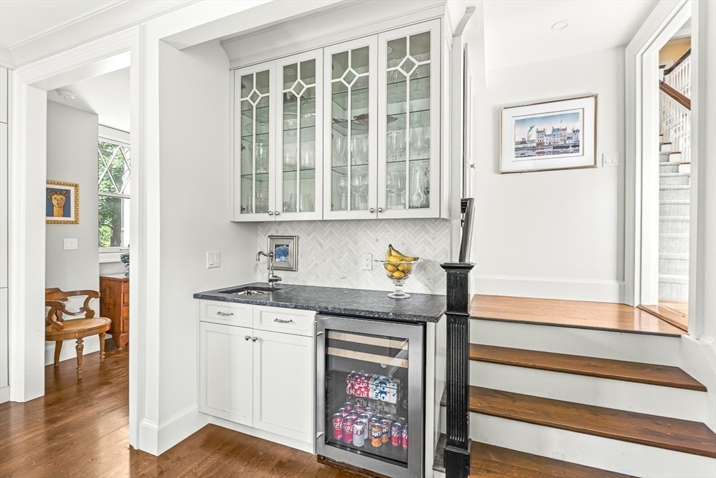5 Stratford Road Winchester, MA 01890 - Photo 18 of 39 a kitchen with stainless steel appliances granite countertop a stove and a window