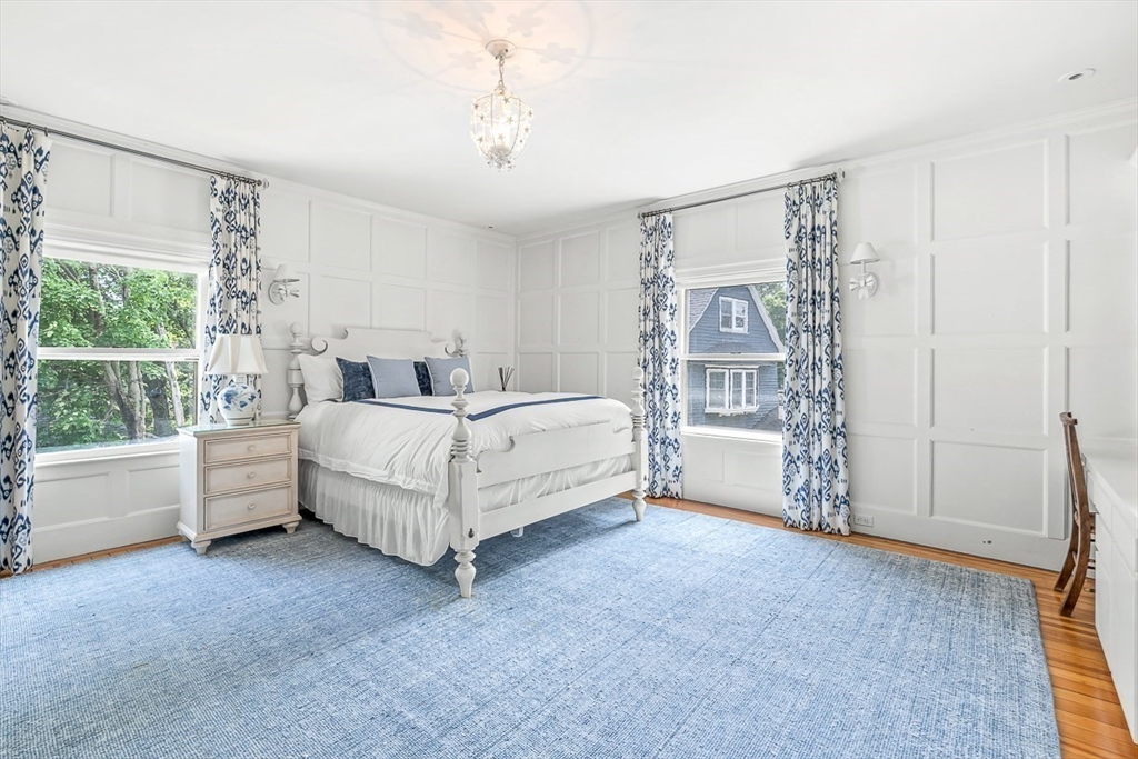 5 Stratford Road Winchester, MA 01890 - Photo 25 of 39 a bed room with a bed and a chair