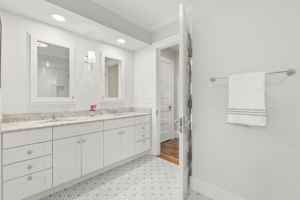5 Stratford Road Winchester, MA 01890 - Photo 28 of 39 a bathroom with a granite countertop sink and a mirror