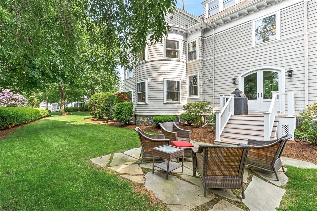 5 Stratford Road Winchester, MA 01890 - Photo 35 of 39 a view of a house with backyard and sitting area