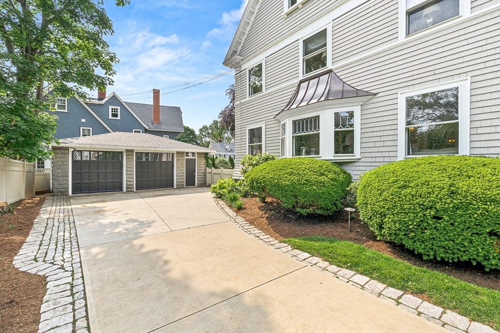 5 Stratford Road Winchester, MA 01890 - Photo 37 of 39 a front view of a house with garden