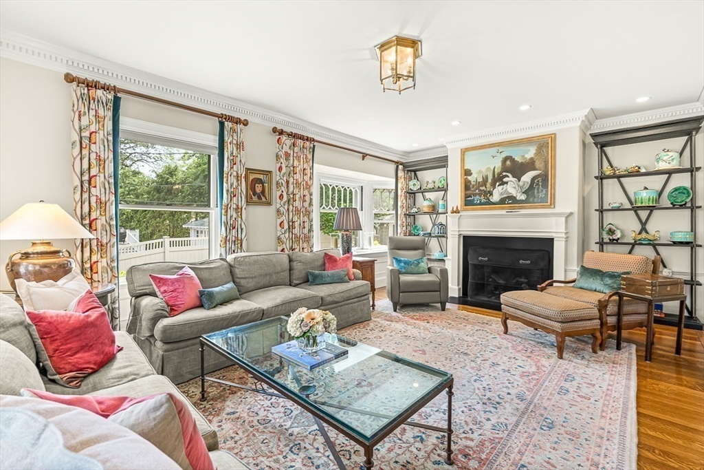 5 Stratford Road Winchester, MA 01890 - Photo 8 of 39 a living room with furniture fireplace and a large window
