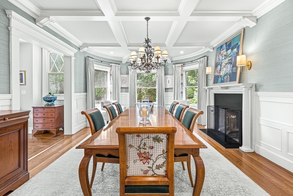 5 Stratford Road Winchester, MA 01890 - Photo 10 of 39 a dining room with furniture a fireplace and wooden floor