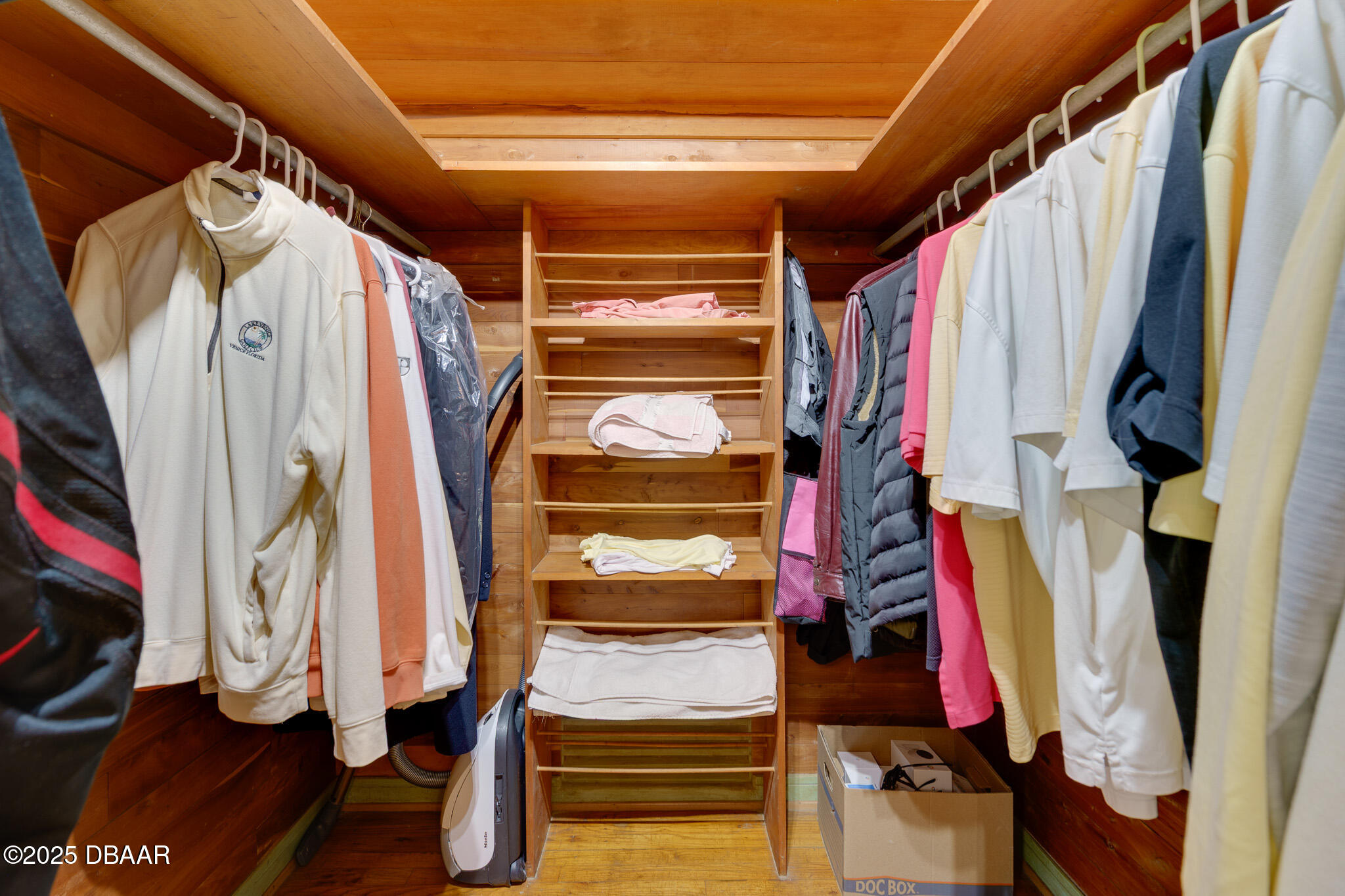 46 Oceanview Avenue Ponce Inlet, FL 32127 - Photo 29 of 79 a view of walk in closet with clothes and shoes