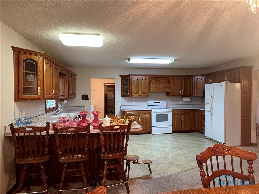 1032 Jennings Road Van Wert, OH 45891 - Photo 8 of 25 View of kitchen from the dining room