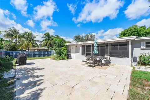 a view of a house with sitting area