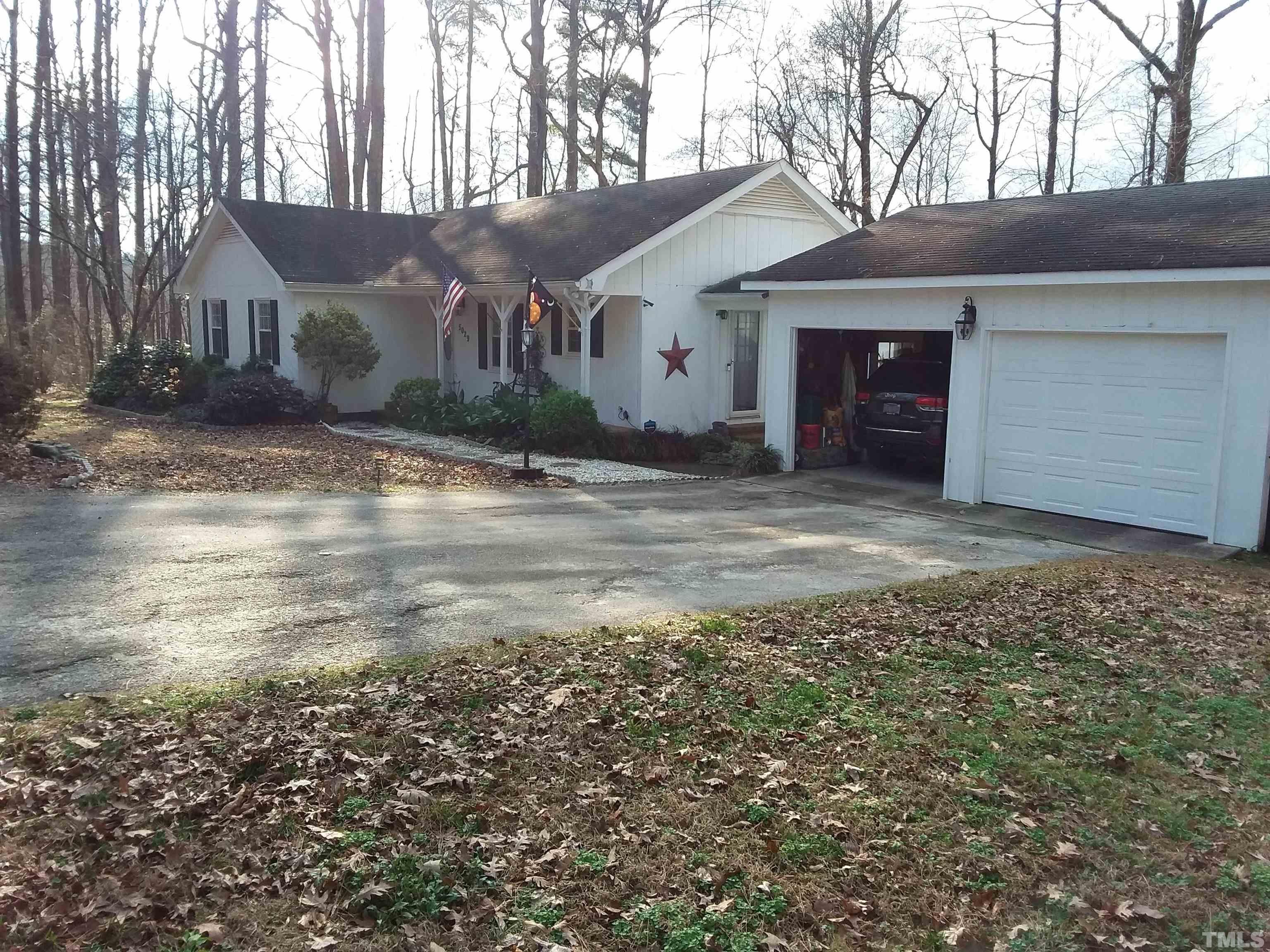 5029 Hurmax Lane Raleigh, NC 27610 - Photo 4 of 52 spacious garage with walk way to home