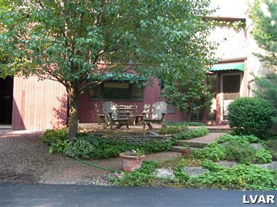 3681 Township Line Road Bethlehem, PA 18020 - Photo 11 of 19 a backyard of a house with table and chairs