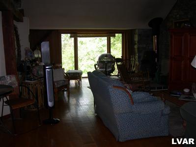 3681 Township Line Road Bethlehem, PA 18020 - Photo 17 of 19 a living room with furniture and a floor to ceiling window
