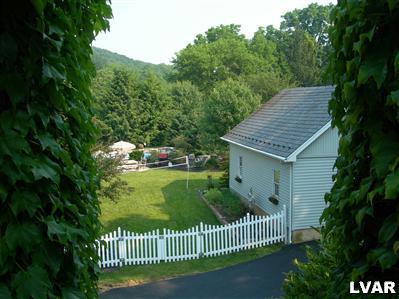 3681 Township Line Road Bethlehem, PA 18020 - Photo 19 of 19 a view of a wooden deck and a yard