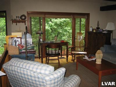 3681 Township Line Road Bethlehem, PA 18020 - Photo 5 of 19 a living room with furniture and a floor to ceiling window