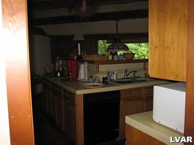 3681 Township Line Road Bethlehem, PA 18020 - Photo 10 of 19 a kitchen with a sink and cabinets
