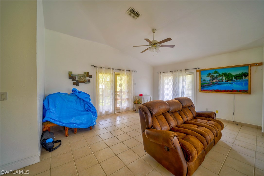 4050 Staley Road Fort Myers, FL 33905 - Photo 11 of 25 a living room with furniture a rug and a window