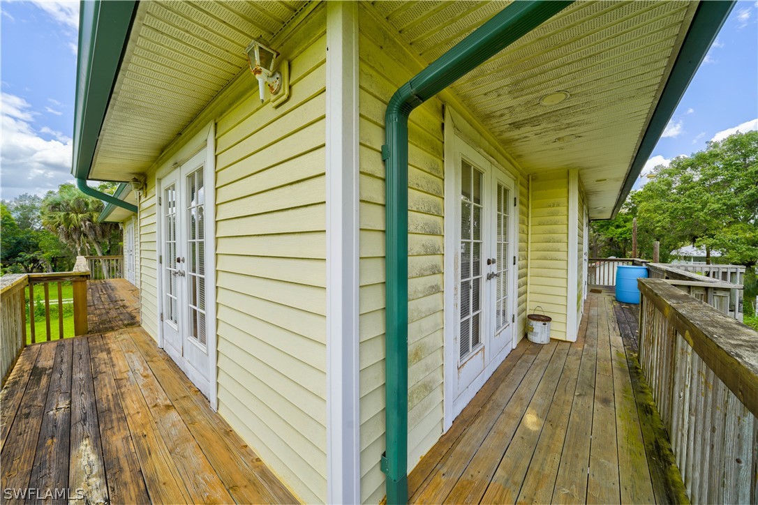 4050 Staley Road Fort Myers, FL 33905 - Photo 22 of 25 a view of balcony and wooden floor
