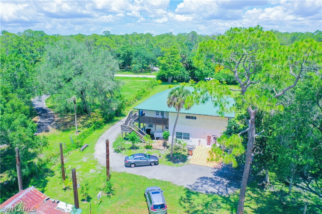 4050 Staley Road Fort Myers, FL 33905 - Photo 4 of 25 an aerial view of a house with a yard