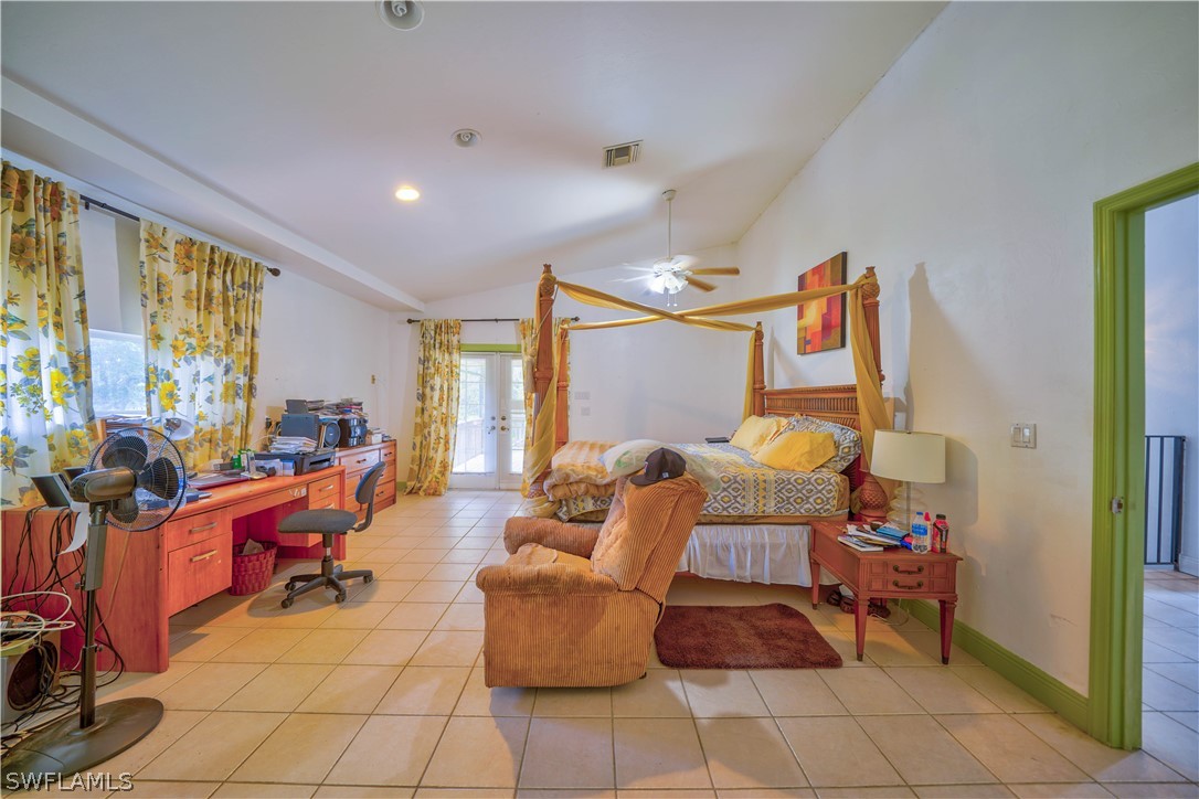 4050 Staley Road Fort Myers, FL 33905 - Photo 8 of 25 a living room with furniture a rug and a large window