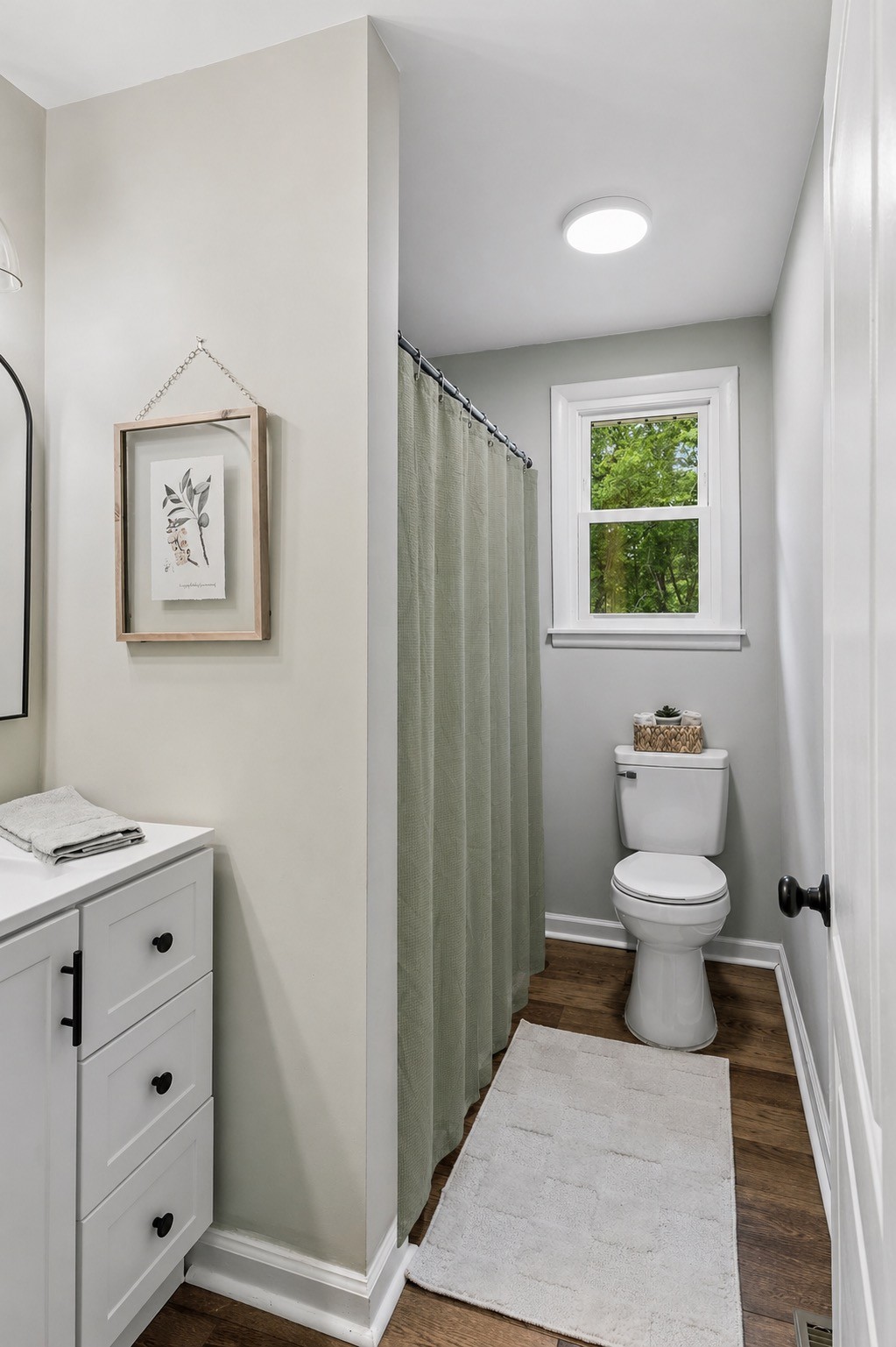 3908 Cedar Street Centerville, TN 37033 - Photo 23 of 31 a bathroom with a toilet a sink and a mirror