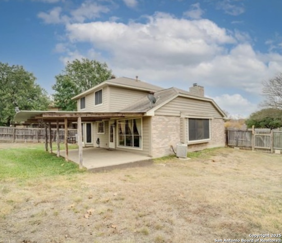 15022 Baycliff San Antonio, TX 78233 - Photo 12 of 15 a view of a house with a yard and sitting area