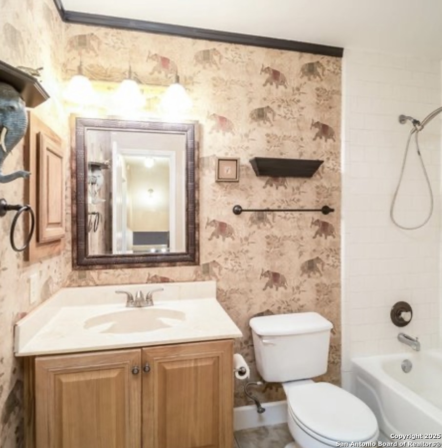 15022 Baycliff San Antonio, TX 78233 - Photo 9 of 15 a bathroom with a sink vanity mirror and toilet