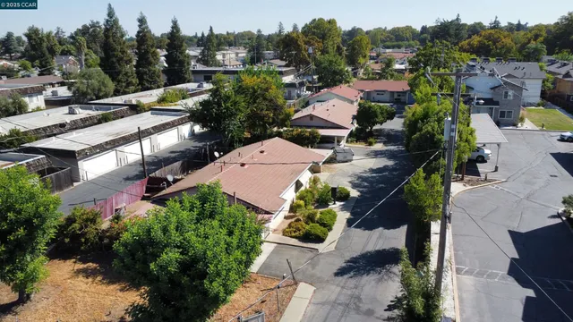 an aerial view of a house with a garden