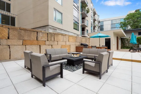 a view of a backyard with potted plants