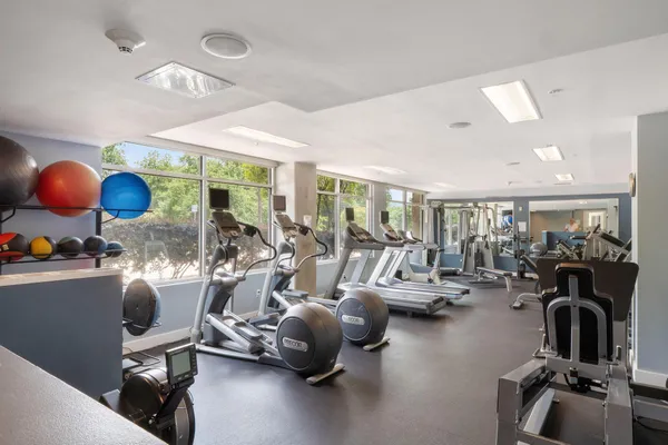 a view of a house with backyard and garden