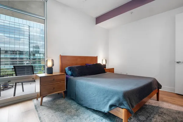 a view of an entryway with wooden floor