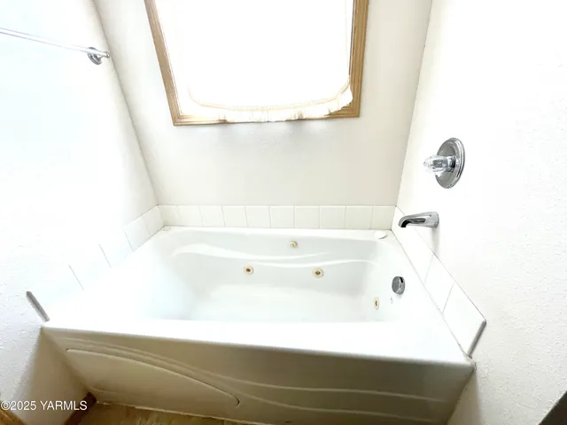 a bathroom with a bathtub