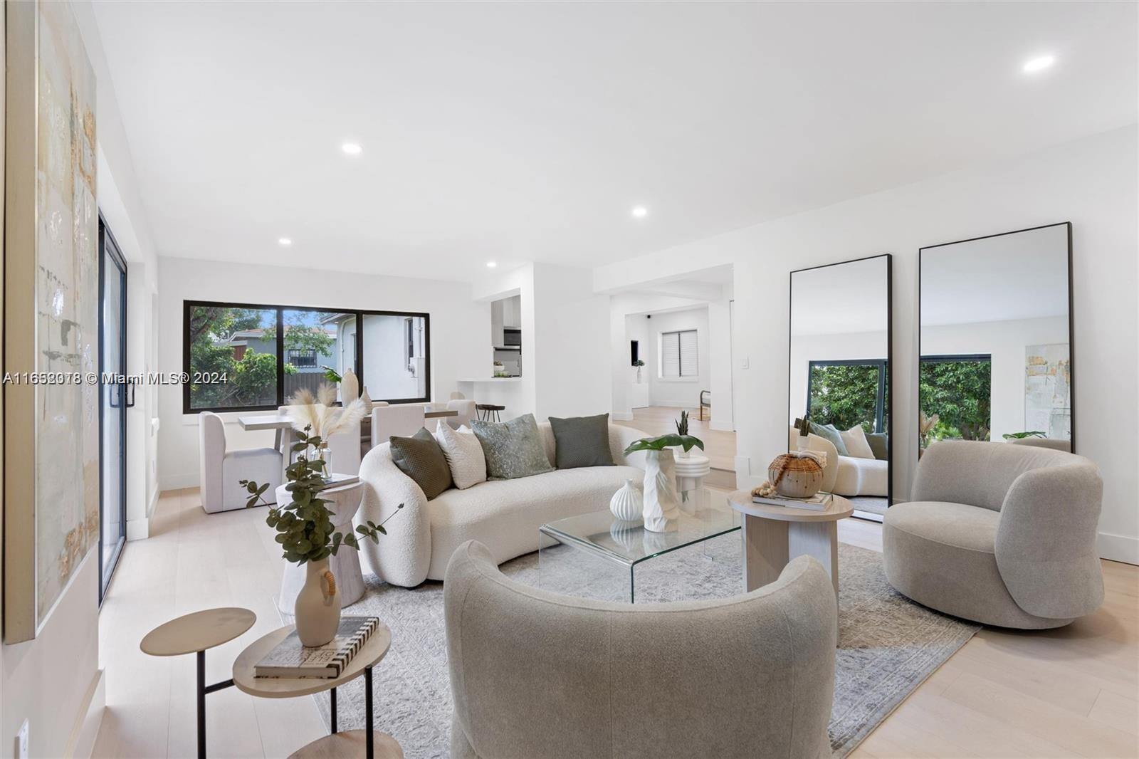 151 Northwest 146th Street Miami, FL 33168 - Photo 17 of 35 a living room with furniture and a large window
