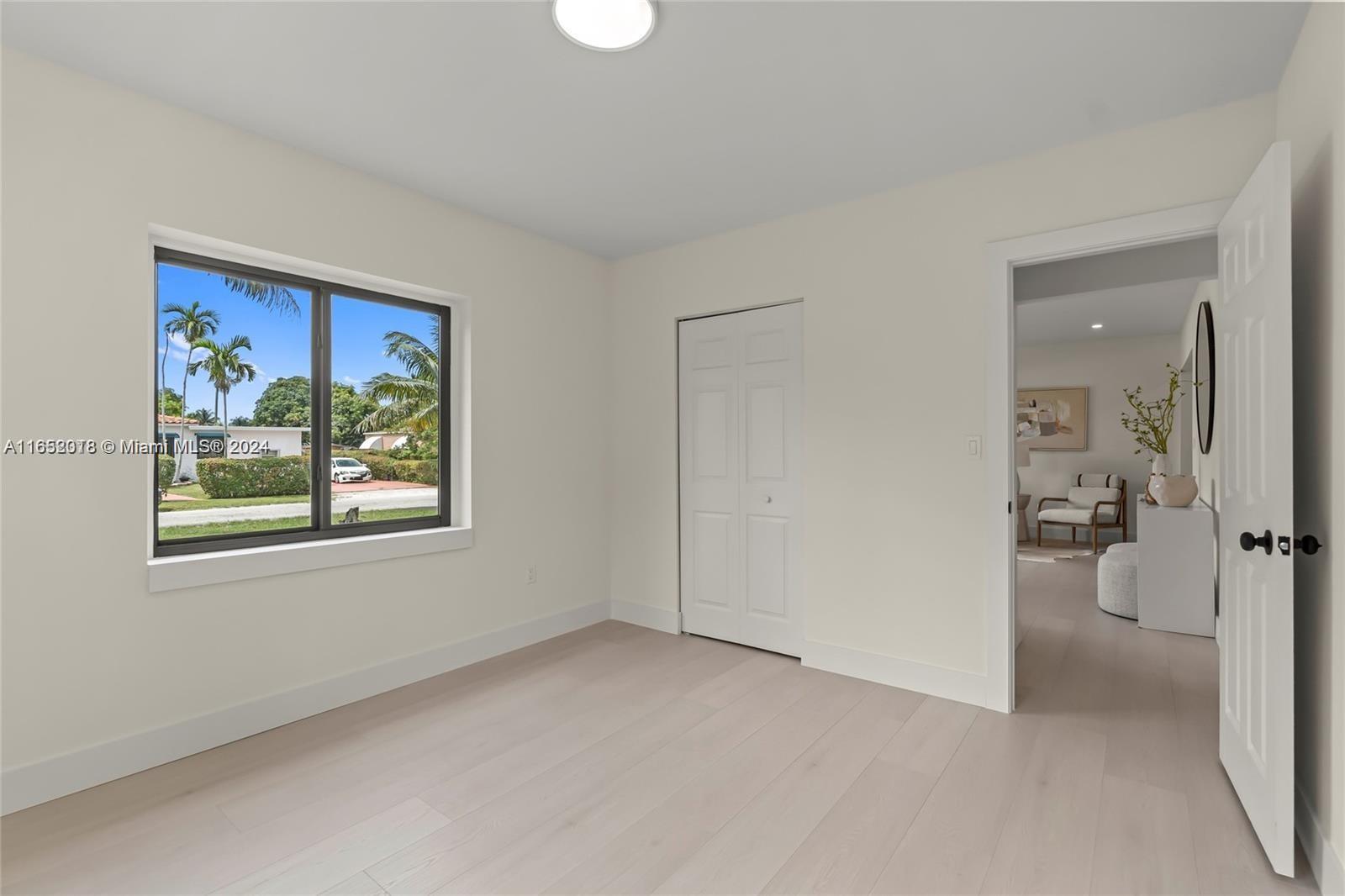 151 Northwest 146th Street Miami, FL 33168 - Photo 27 of 35 a view of an empty room and a gallery