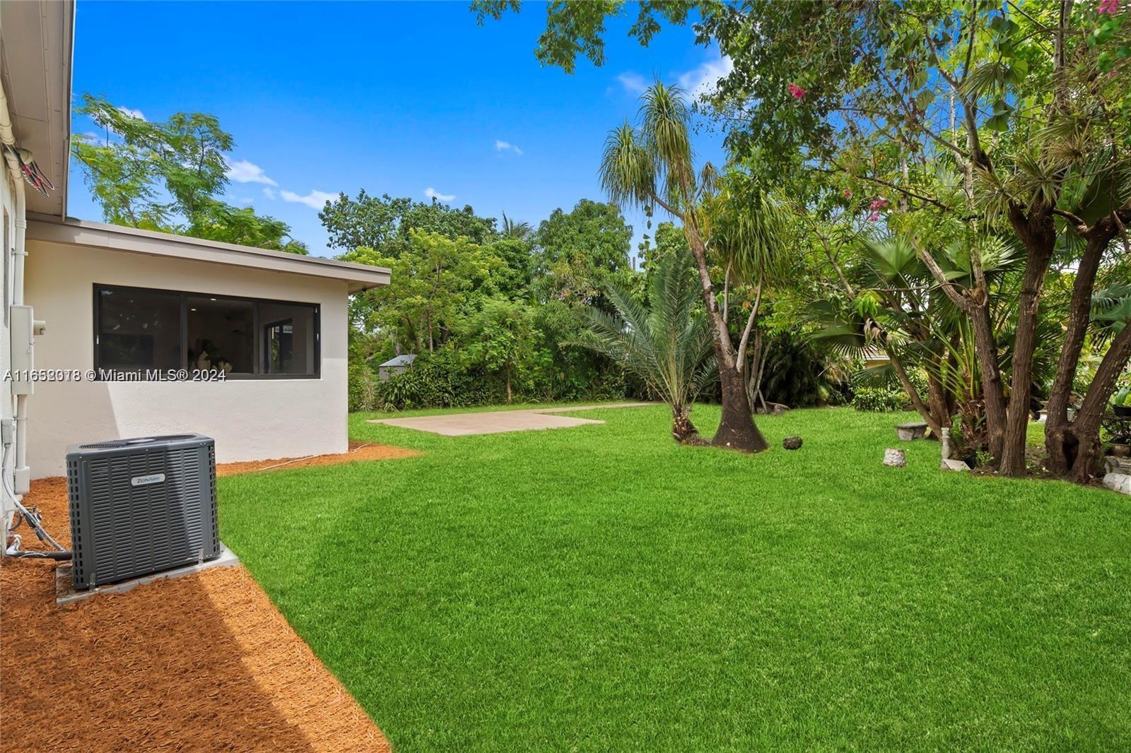 151 Northwest 146th Street Miami, FL 33168 - Photo 32 of 35 a view of a garden